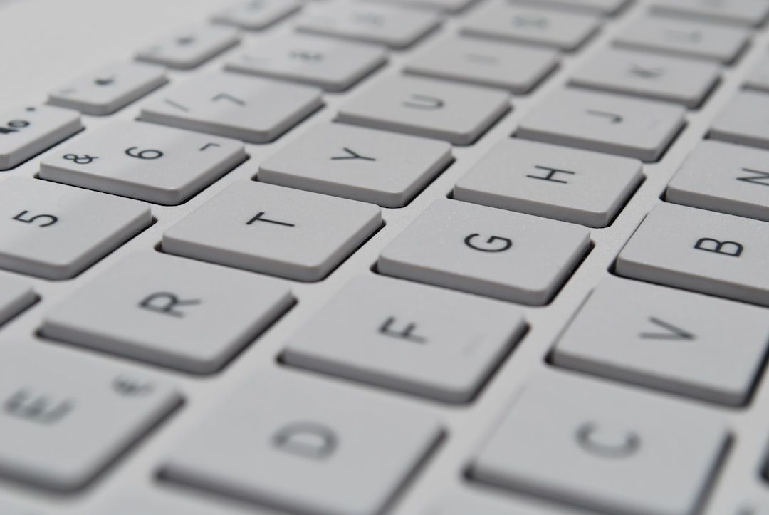 Close-up of a computer keyboard collecting dust