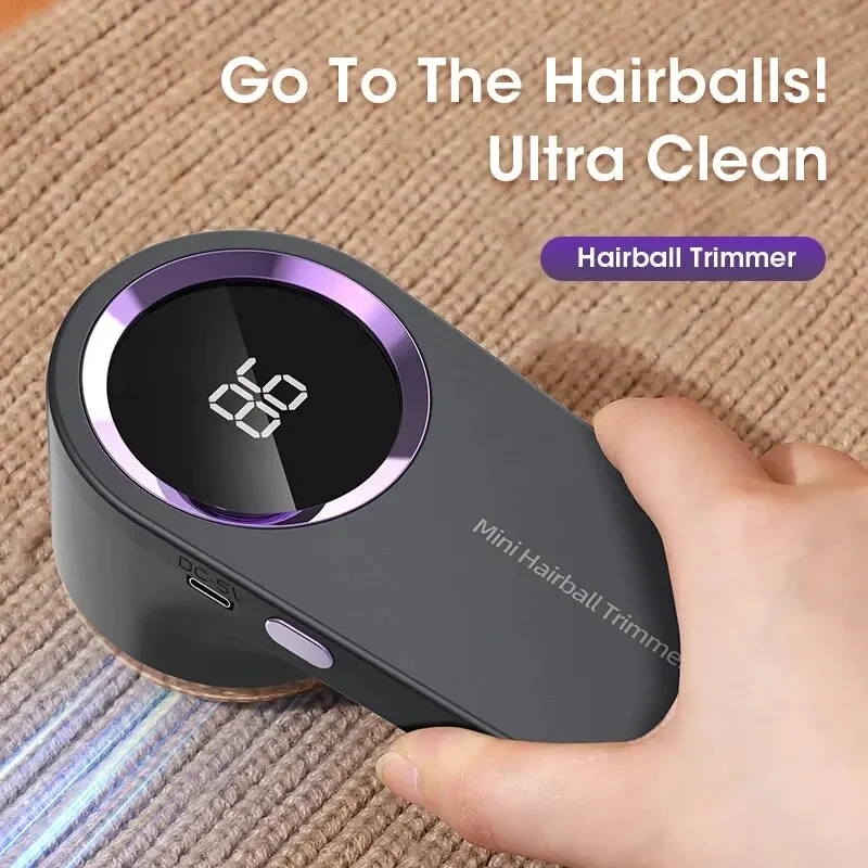 Electric lint remover shaving pills off a sweater